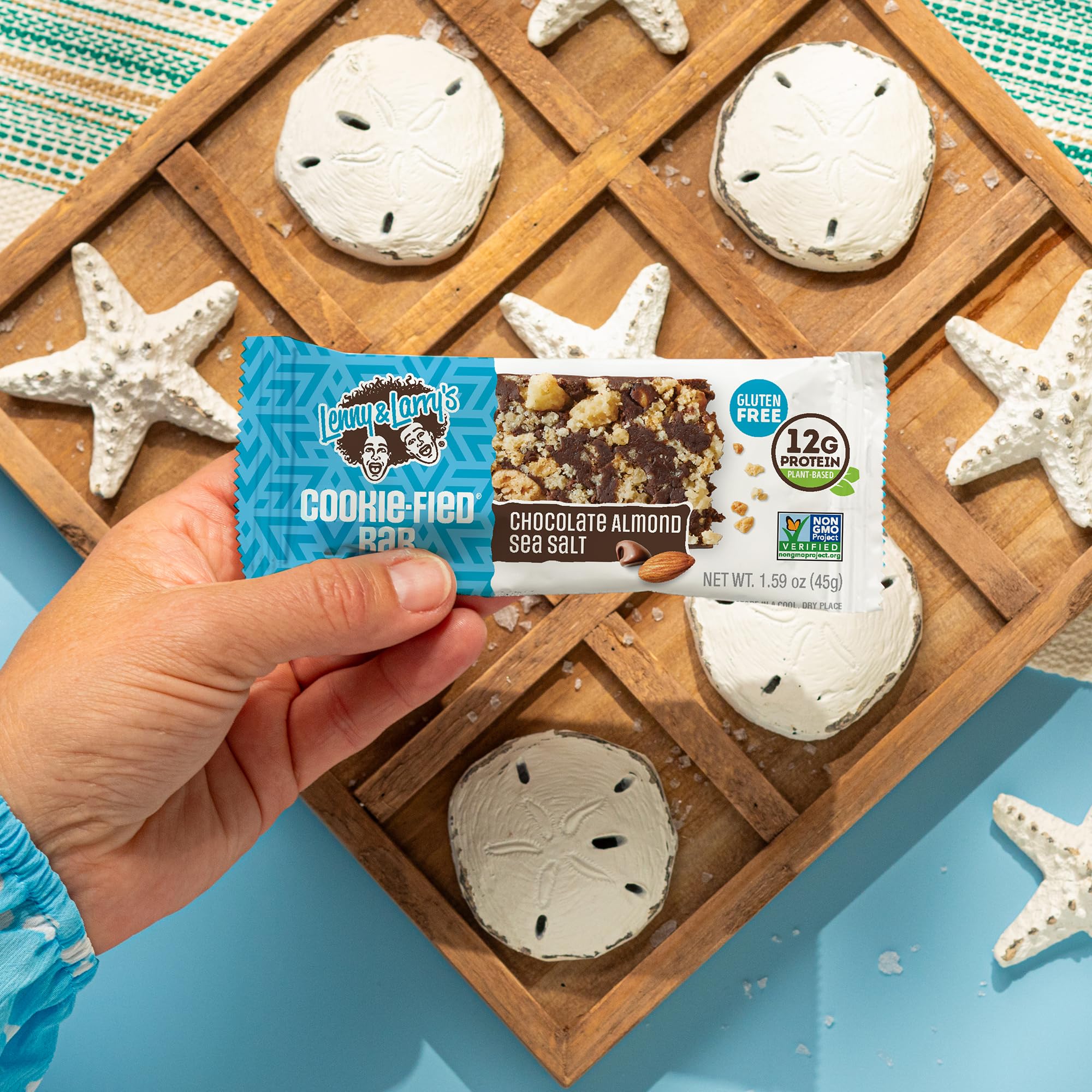 Lenny & Larry's Cookie-fied Bar bite shot suggests a flavorful protein boost.