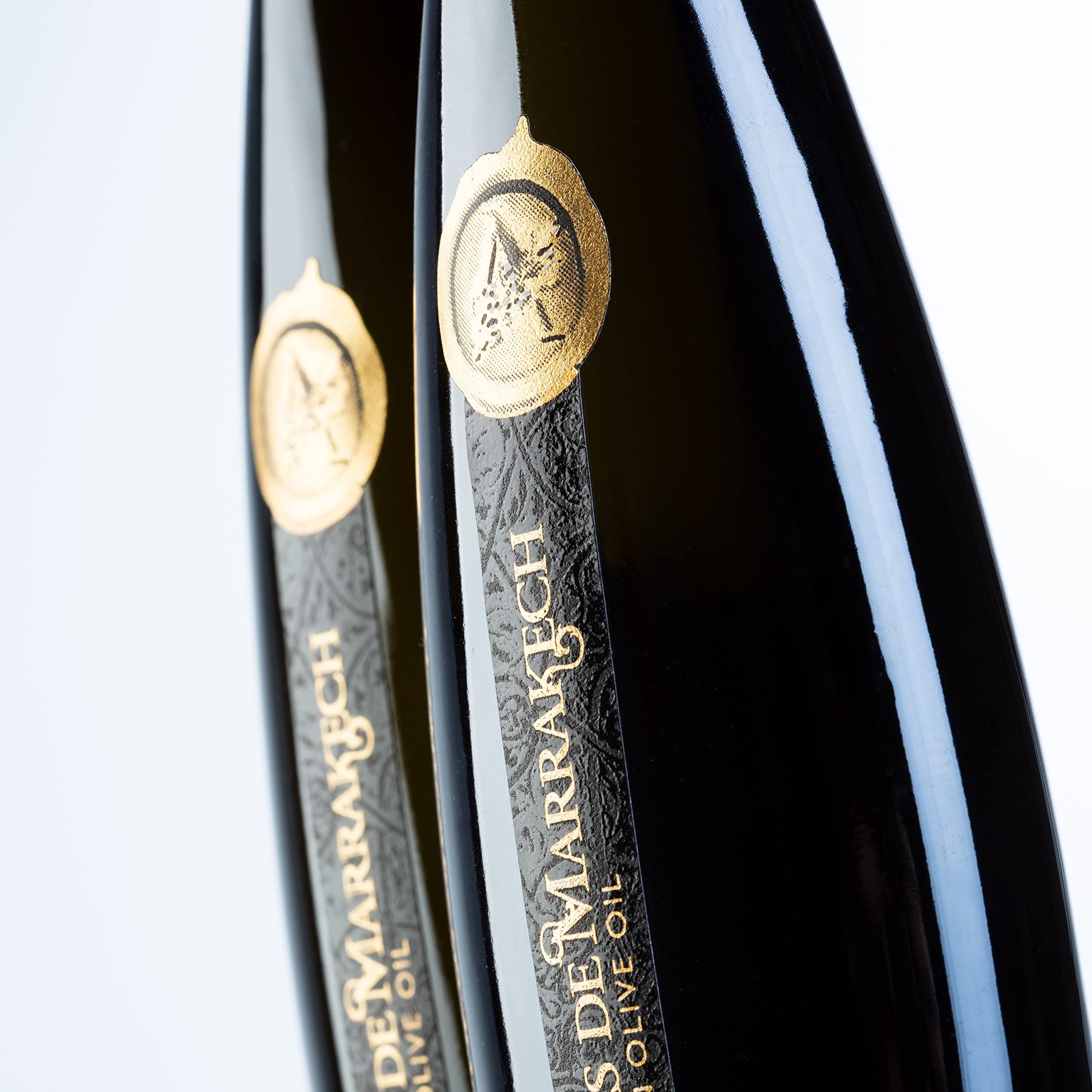 Les Terroirs de Marrakech bottle on counter communicates premium packaging for home cooks.