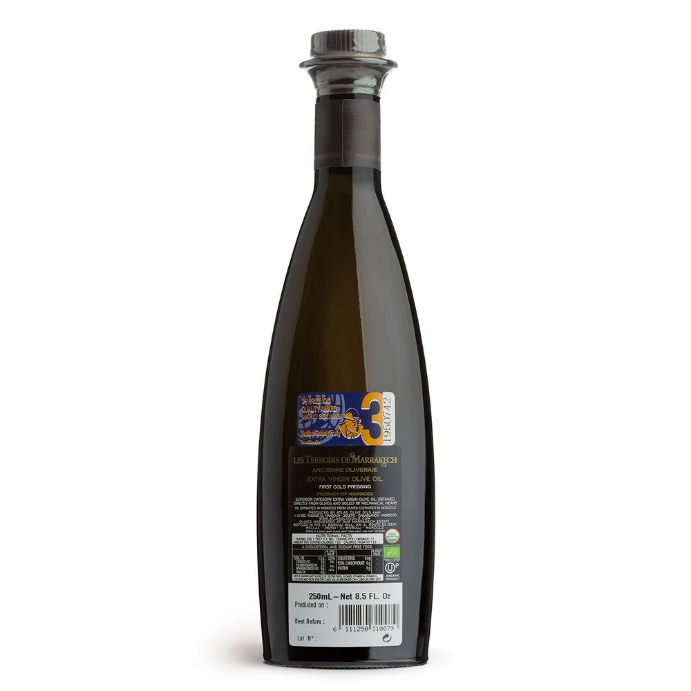 Les Terroirs De Marrakech label closeup highlights authentic origin and brand quality.