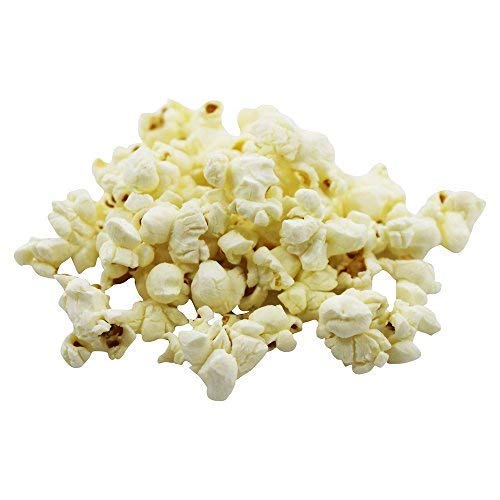Close-up of ghee-coated kernels from Lesserevil Oh My Ghee, rich aroma.