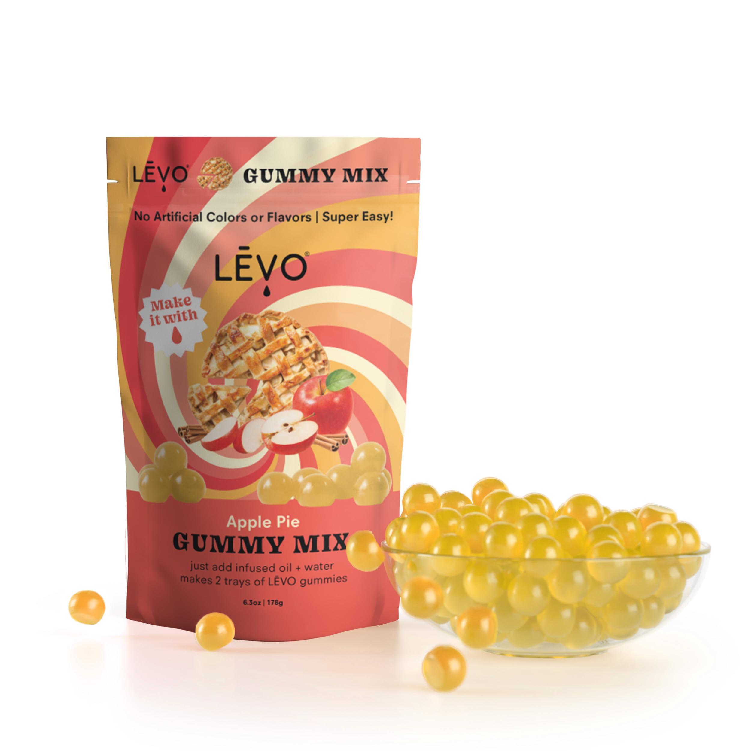 LEVO hand pouring gummy mixture into silicone molds for consistent results