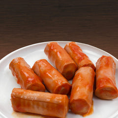 Libby's sausages heating in skillet offering warmed flavor and crisping