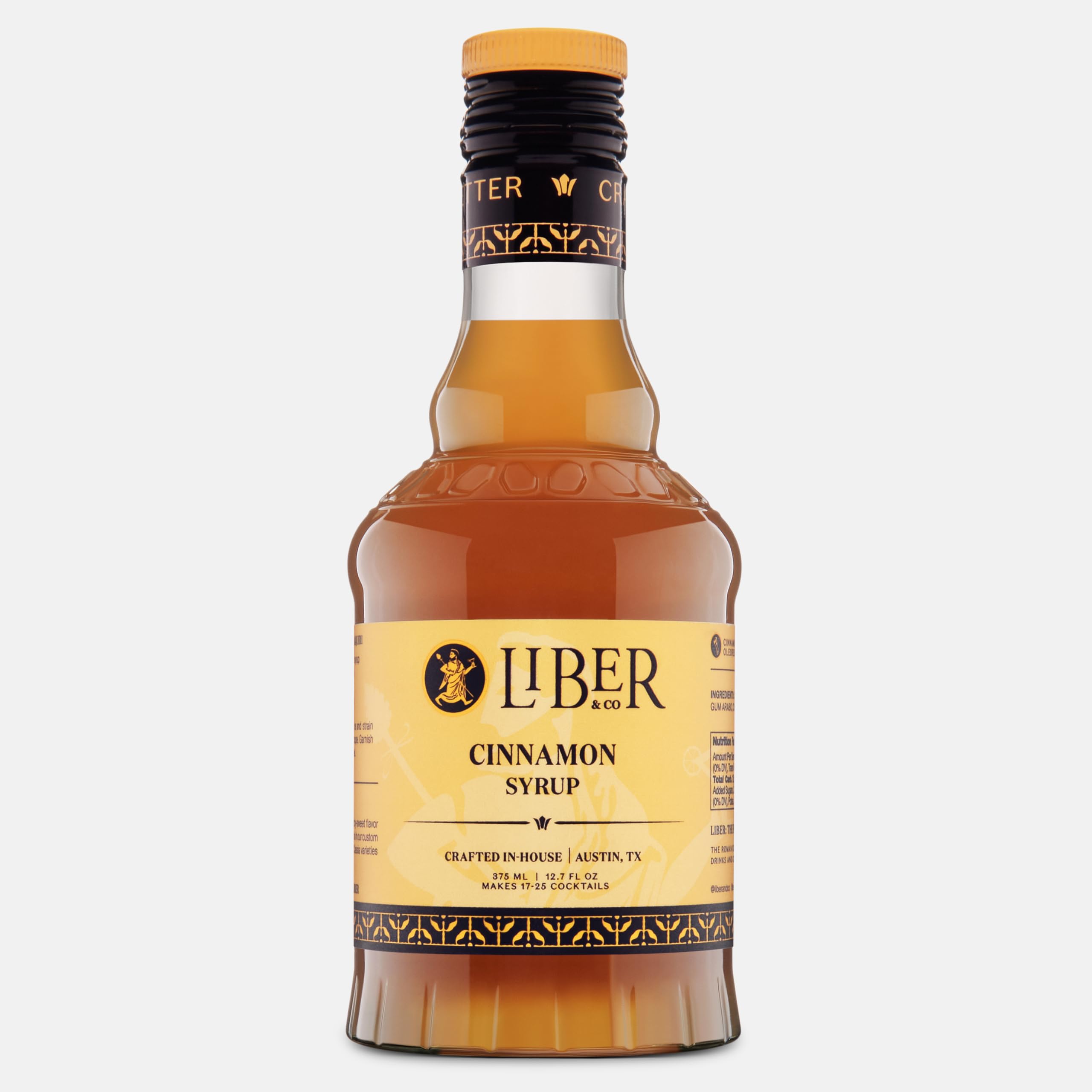 Liber & Co. Cinnamon Syrup bottle for coffee flavor enhancement.