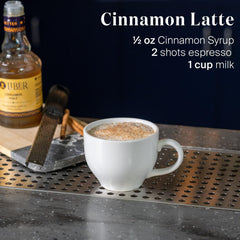 Cinnamon latte with Liber & Co. syrup in a mug.
