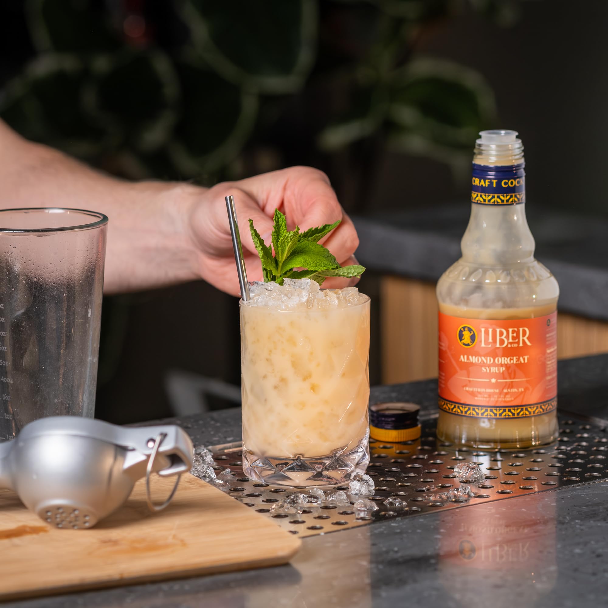 Liber & Co. Mai Tai ingredients laid out for premium tiki drink prep.