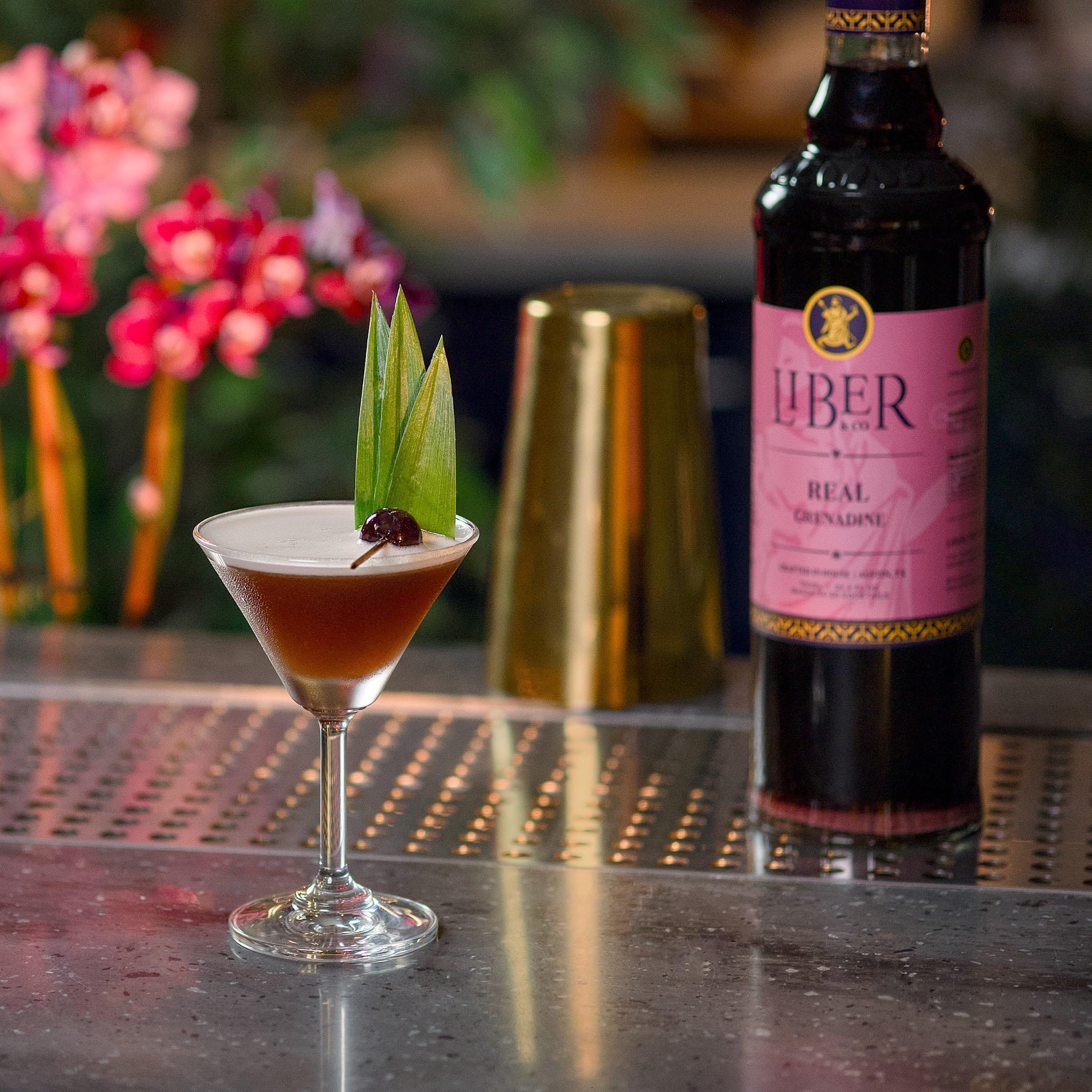 Liber & Co. Real Grenadine pour action, adding depth to drinks.