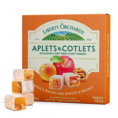 Liberty Orchards Aplets & Cotlets gift box open, inviting gourmet treat for celebrations.
