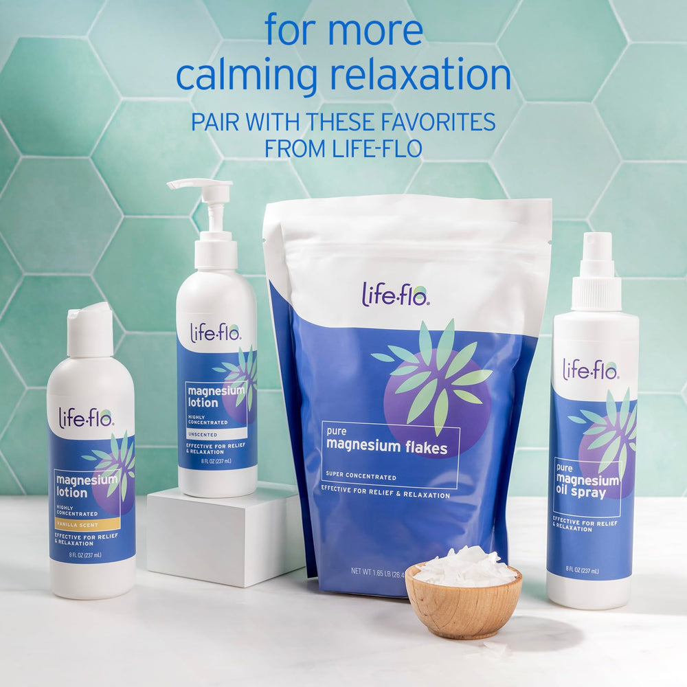 Life-flo Pure Magnesium Bath Flakes packaging shown in a GMP facility context.