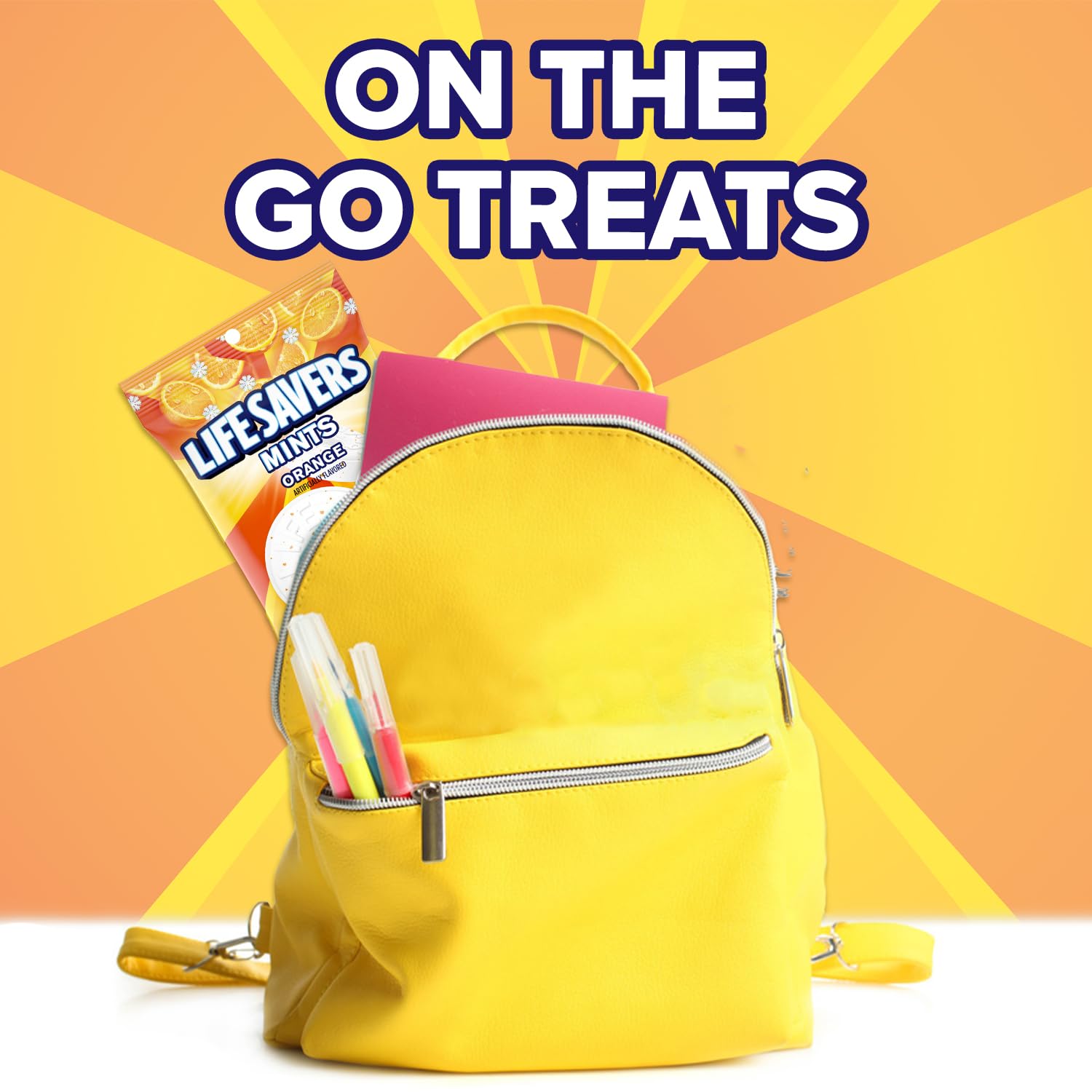 Life Savers orange mints in a lunchbox indicate tasty compact pick me up.