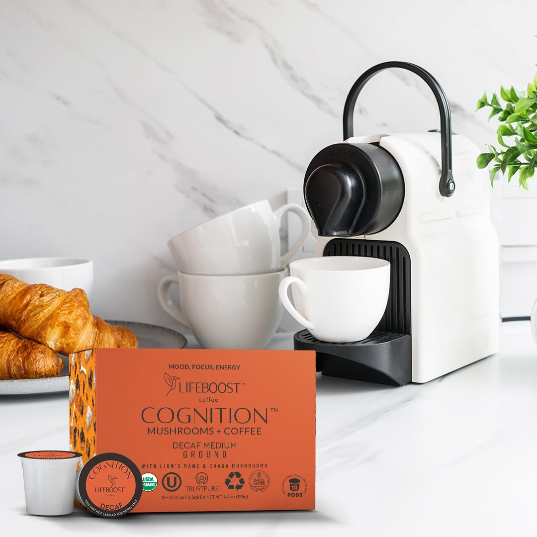 Lifeboost Cognition decaf mushroom pod in a Keurig slot for quick caffeine-free focus.