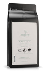 Lifeboost Half Caff coffee bag with cup, highlighting balanced aroma and flavor.