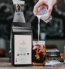 Lifeboost hazelnut brew with smooth crema and low acidity for easy sipping.