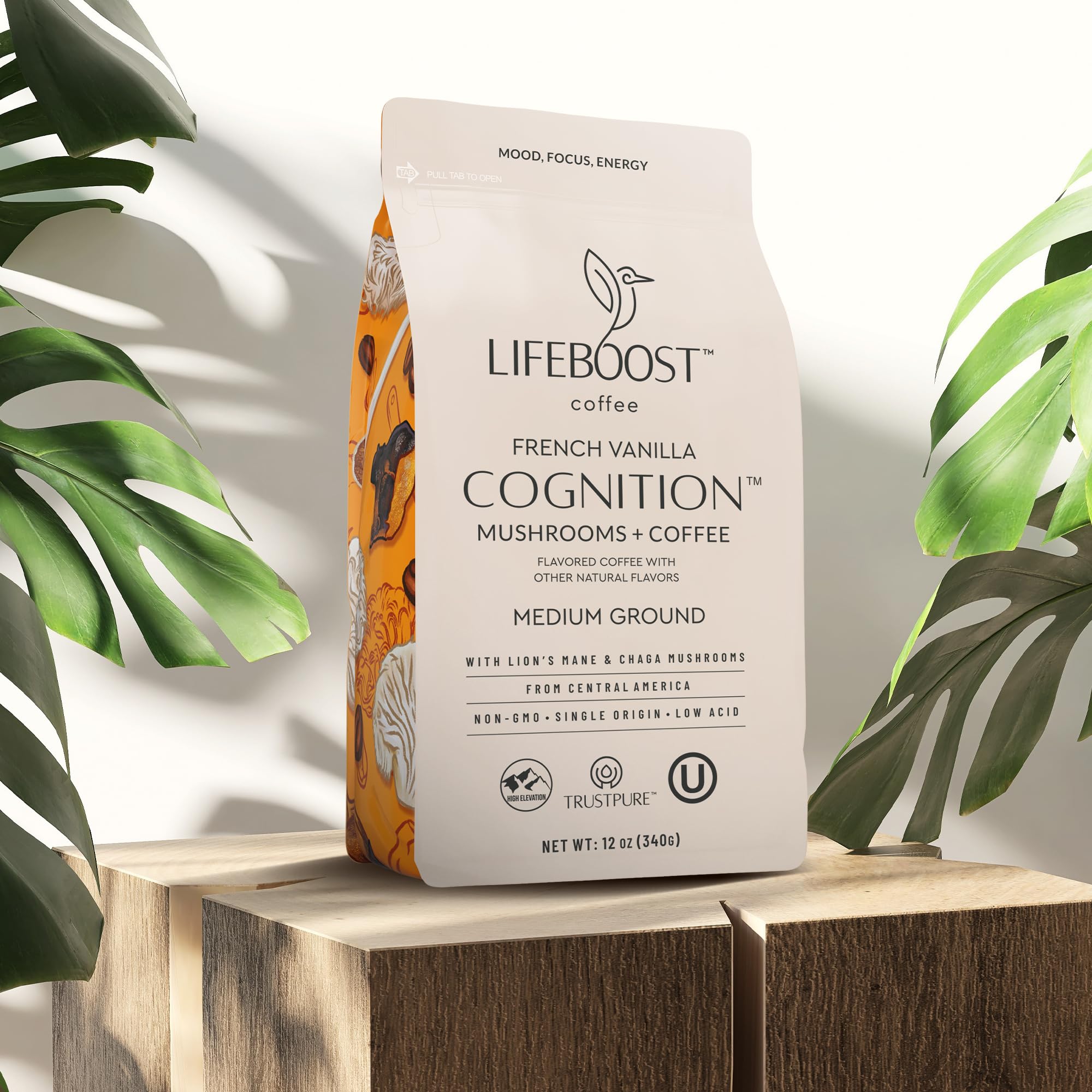 LifeBoost Organic coffee bag on a clean kitchen counter with labeled packaging.