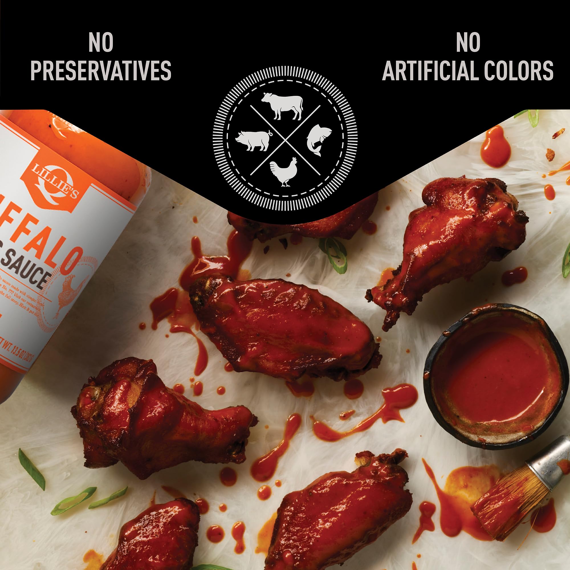 Family enjoying a sauce-covered meal using Lillie's Q Buffalo Wing Sauce