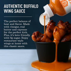 Chicken wings tossed in Lillie's Q Buffalo Wing Sauce for bold flavor