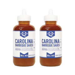Lillie's Q Carolina BBQ Sauce bottle pouring to boost pork flavor