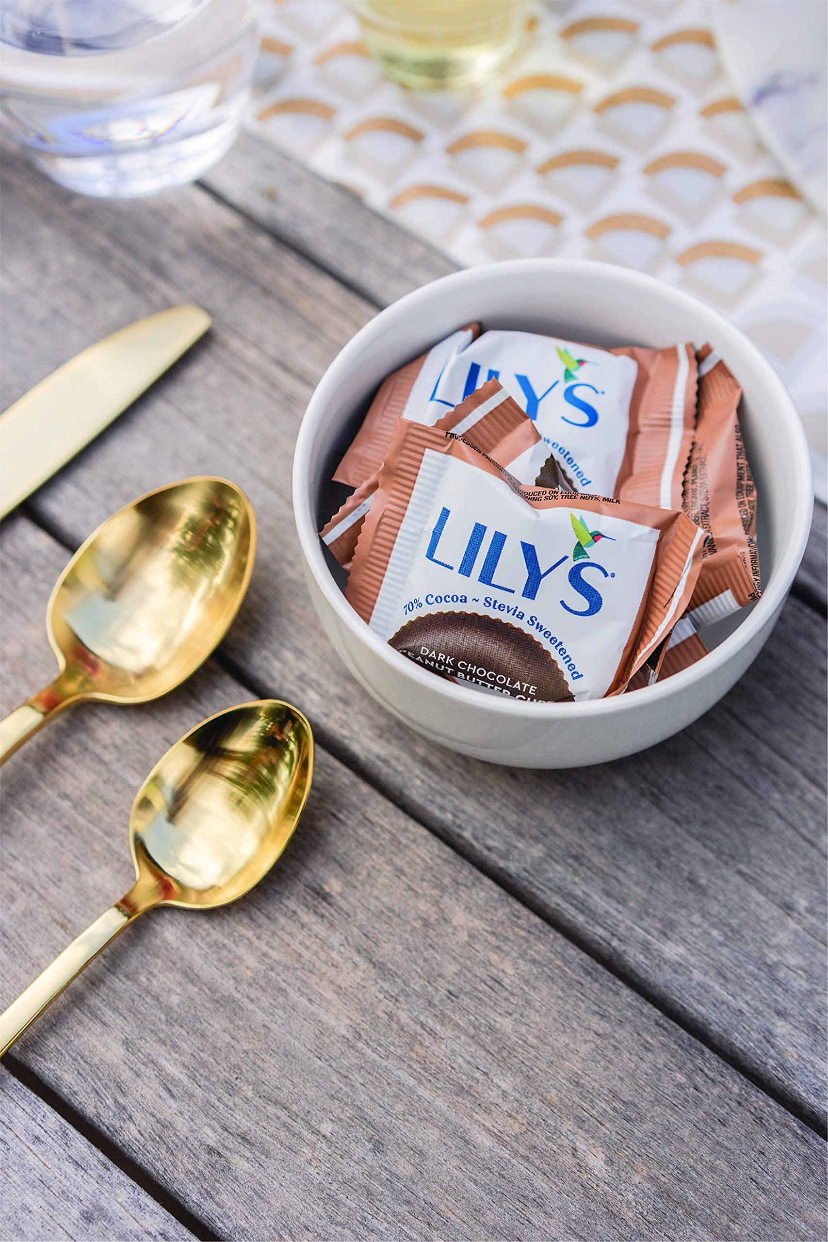 Lily's ingredients highlight gluten-free and non-GMO qualities for mindful snacking.