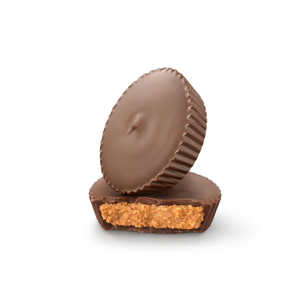 LILY'S no sugar added peanut butter cups table-view, versatile treat for events.