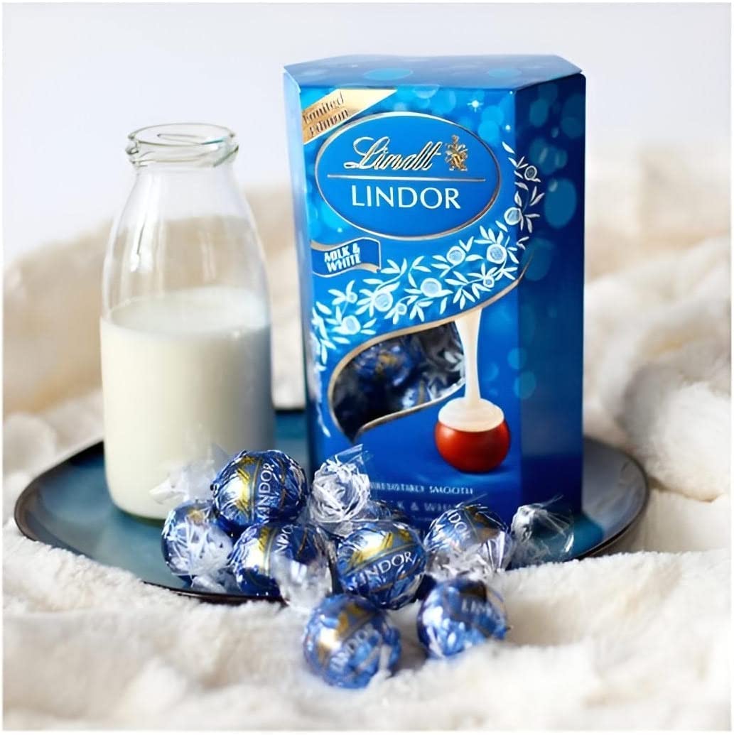 Creamy milk and white chocolate harmony in a silky Lindor bite.