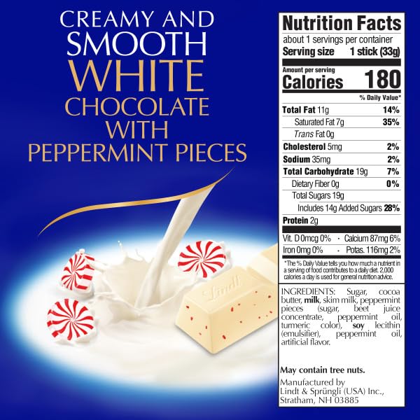 Lindt Classic Recipe White Chocolate Peppermint Stick broken to reveal smooth interior.