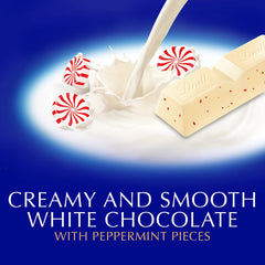Lindt Classic Recipe White Chocolate Peppermint Stick closeup shows creamy texture and peppermint bits.
