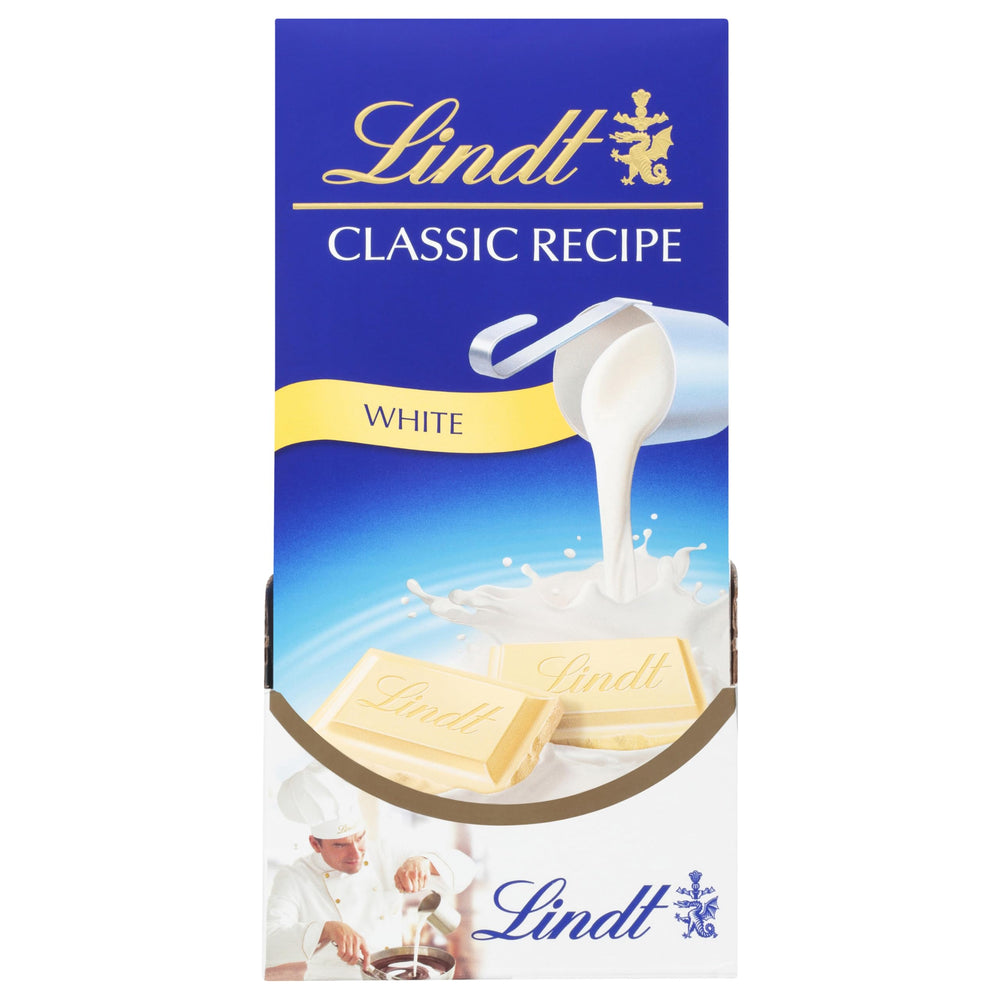 Lindt CLASSIC RECIPE White Chocolate Bar arranged on a dessert plate.