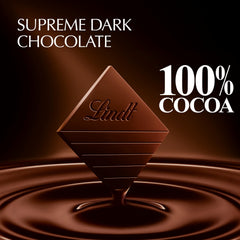 Close-up of Lindt EXCELLENCE 100% Cocoa bar showing silky texture for luxurious tasting.
