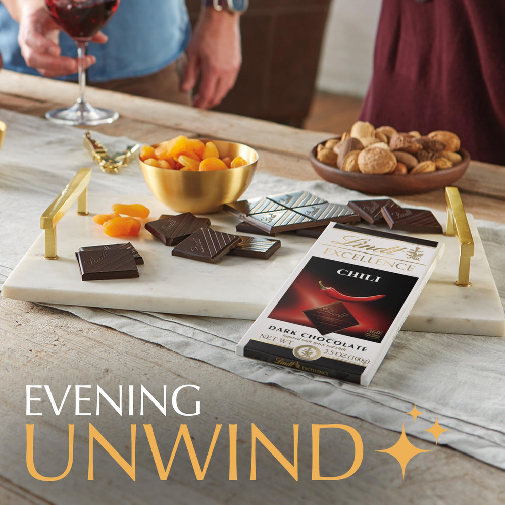 Lindt EXCELLENCE Chili Dark Chocolate Bar packaging highlighting premium ingredients.