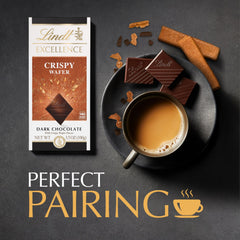 Lindt EXCELLENCE Crispy Wafer dark chocolate closeup with silky melt and wafer crunch.