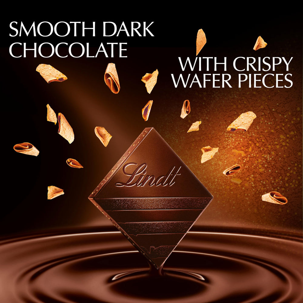 Lindt EXCELLENCE Crispy Wafer wafer pieces add texture to the chocolate bite.