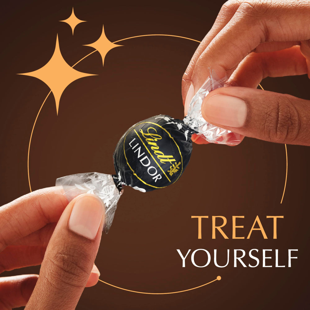 Lindt LINDOR 60% dark chocolate shell detail with rich texture