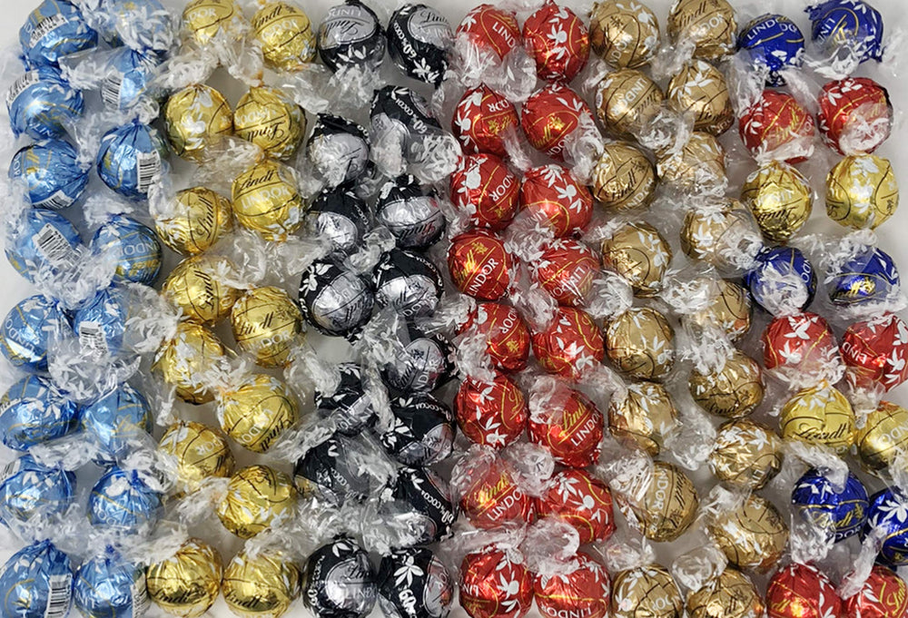 Lindt Lindor assorted truffles box with smooth centers, ideal for celebrations and gifting.