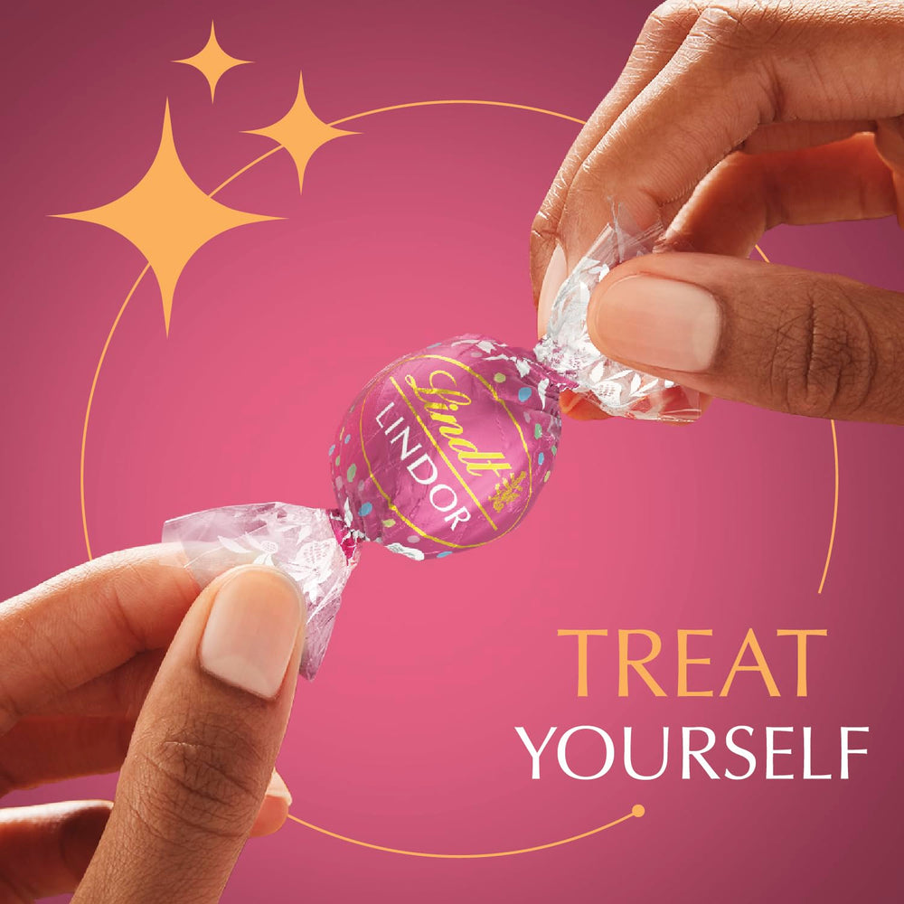 Lindt LINDOR Birthday Cake truffles wrapped individually, convenient snacking.