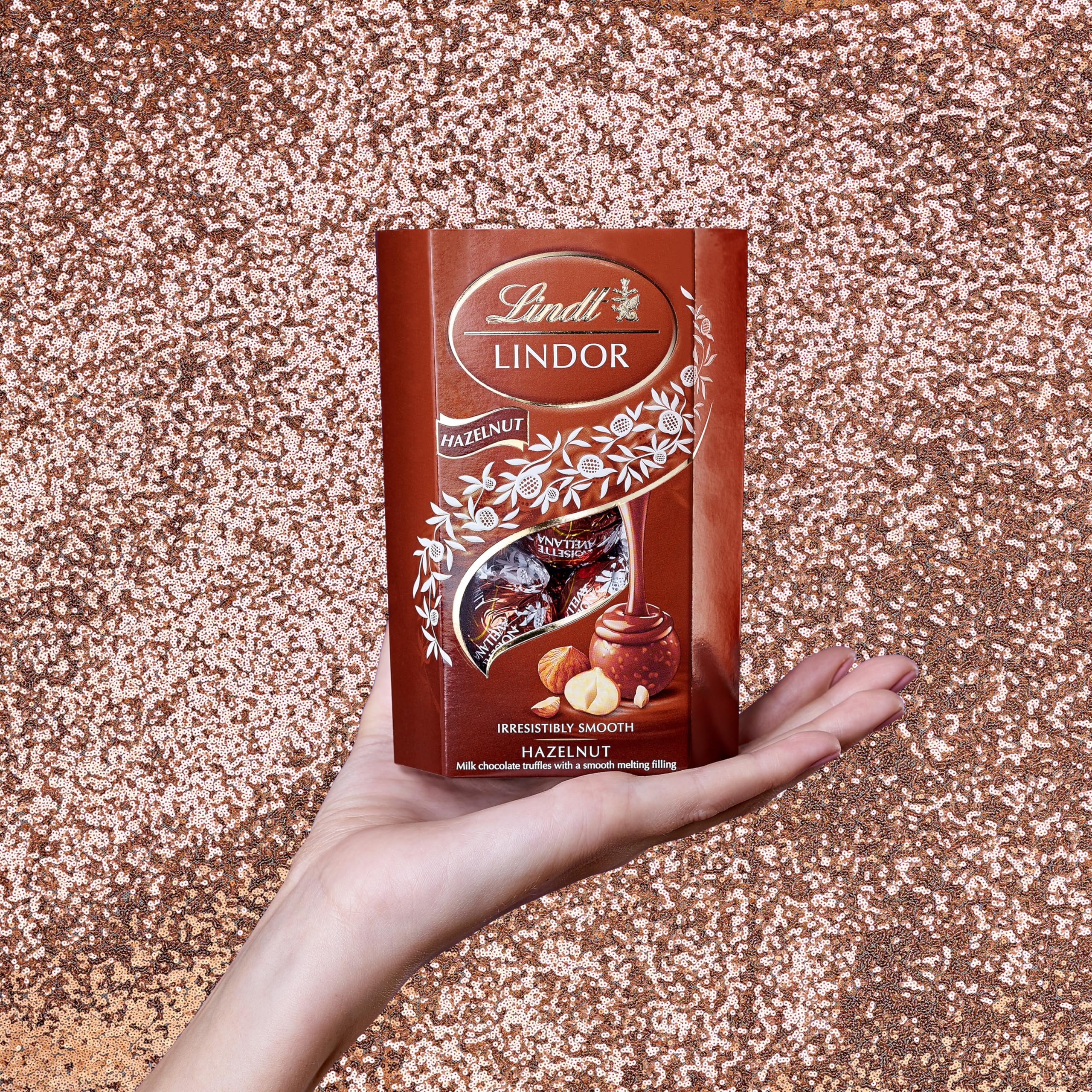 Lindt Lindor Hazelnut 200g closeup pralines showing smooth melt