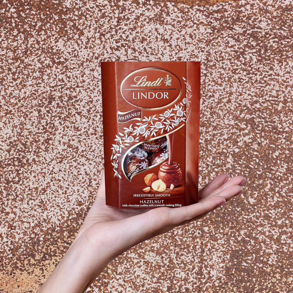 Lindt Lindor Hazelnut 200g closeup pralines showing smooth melt