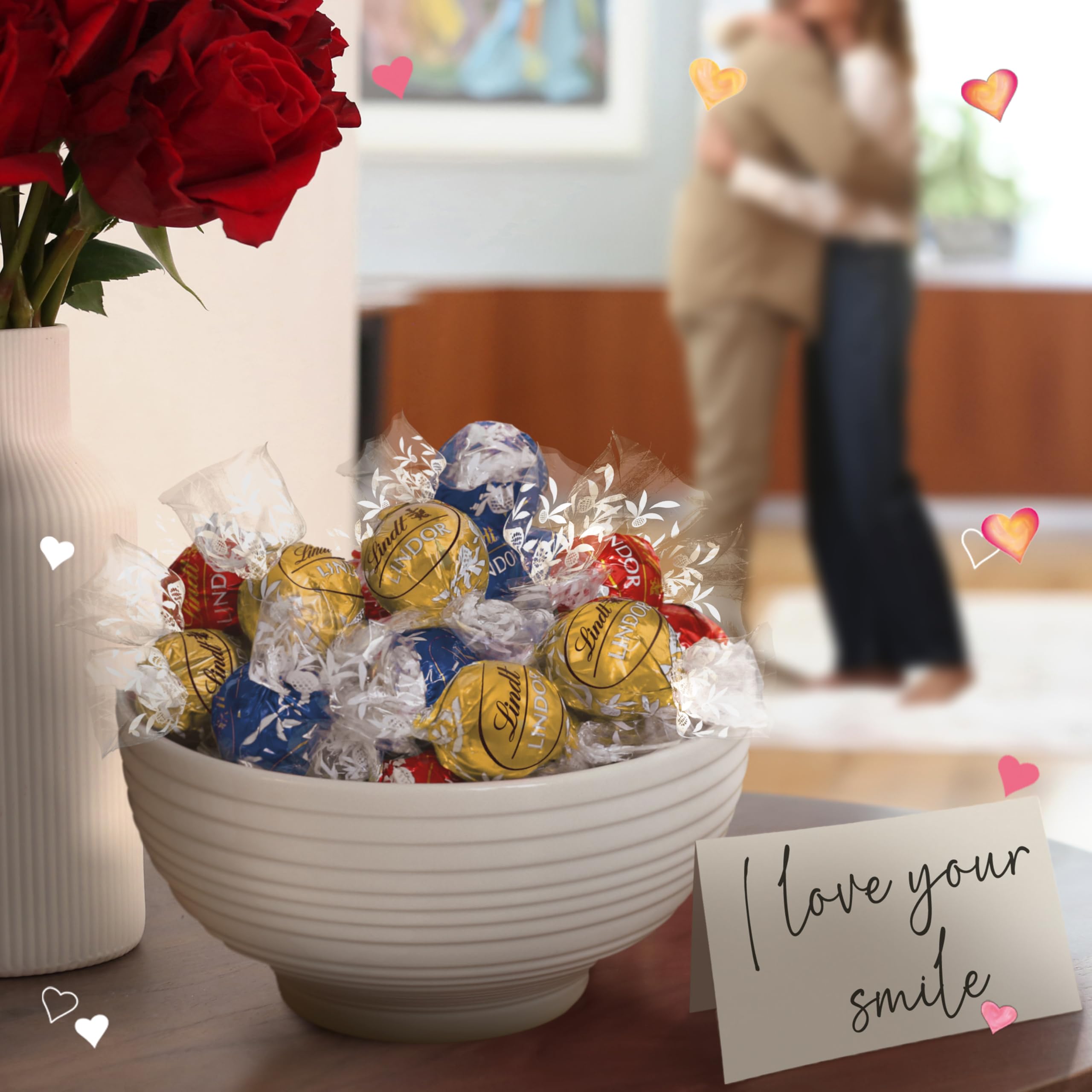 Lindt Lindor milk chocolate truffle shell with melting center—smooth and comforting.