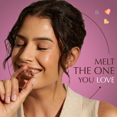 Lindt LINDOR truffles in pink foil wrappers, ready to gift or share with loved ones.