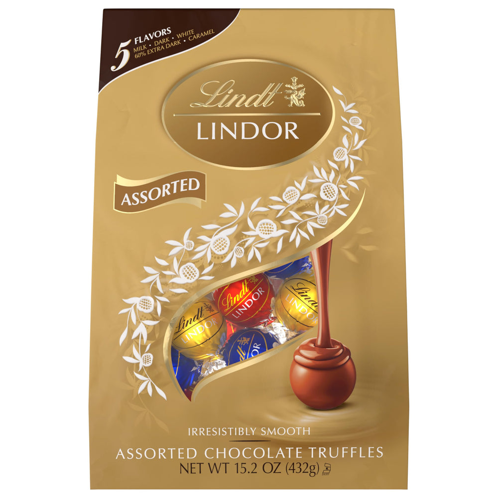 Lindt LINDOR shell-break close-up revealing the melted center.