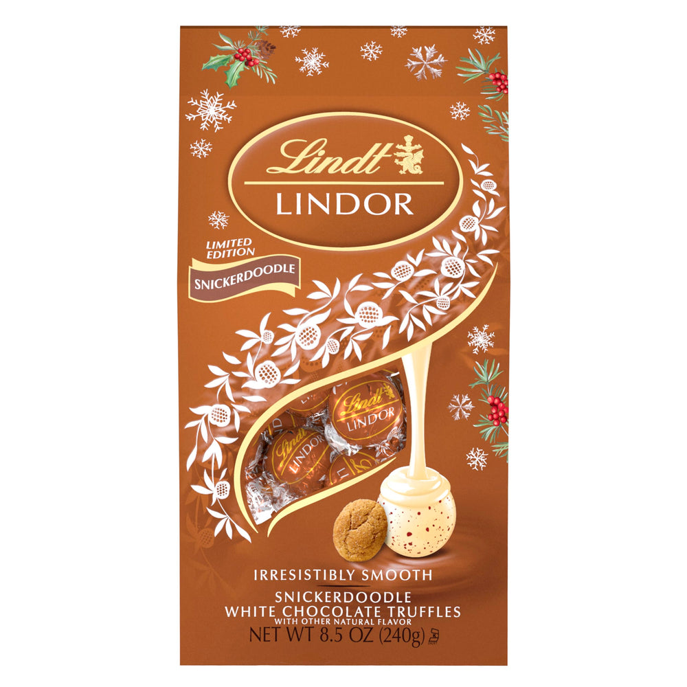 Lindt LINDOR truffles melting on the tongue in a cozy moment