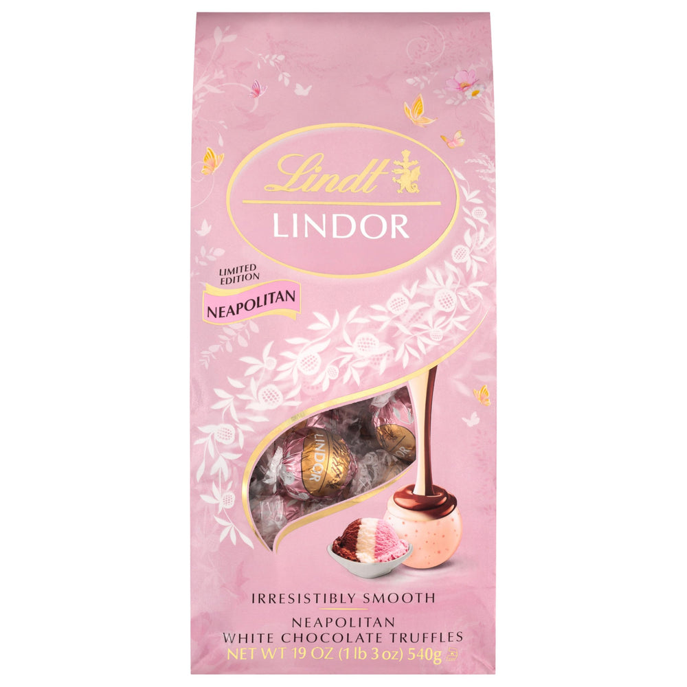 Serving plate showcasing Lindt LINDOR Neapolitan truffles for guests.