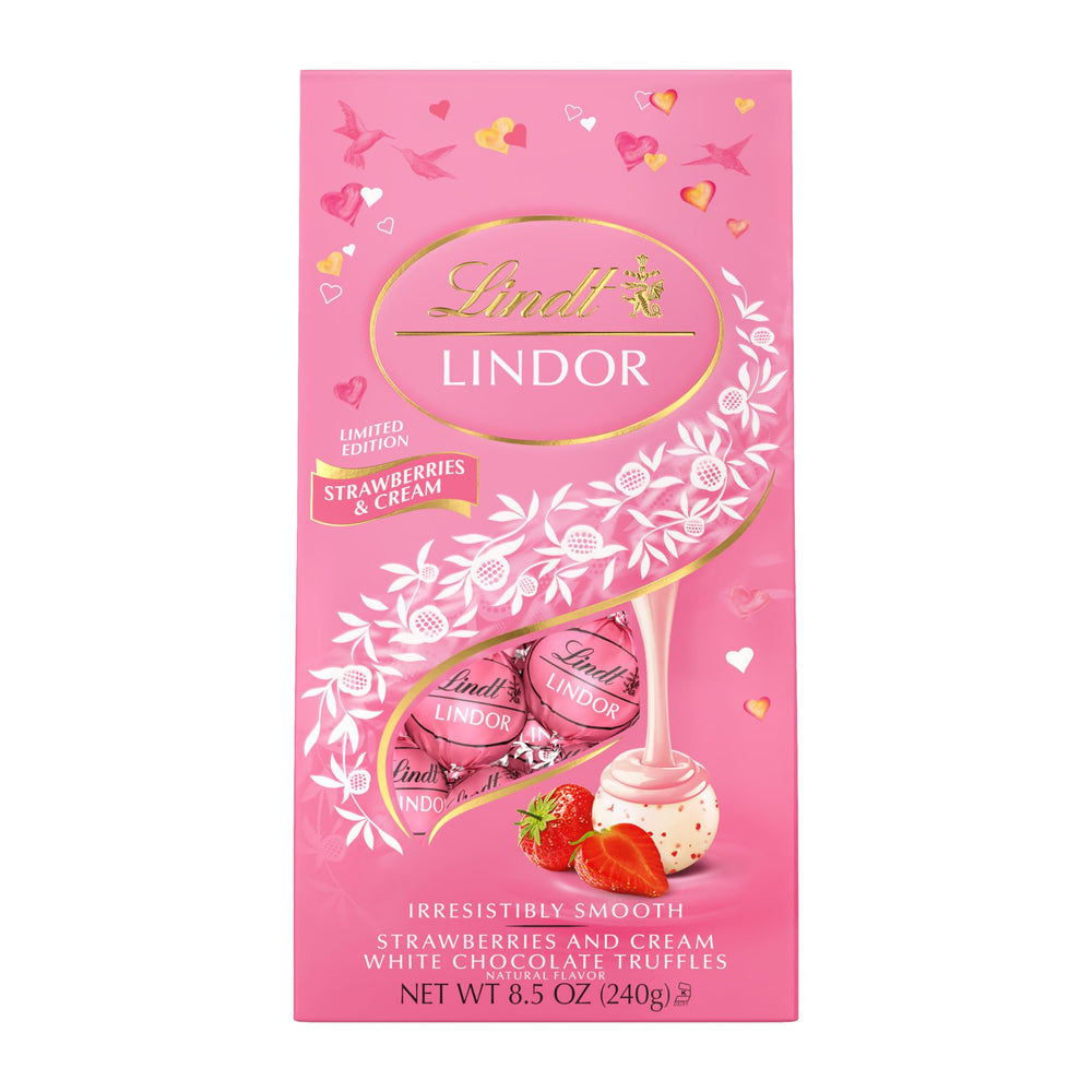 Lindt LINDOR truffles in festive pink bag ideal for gifting.