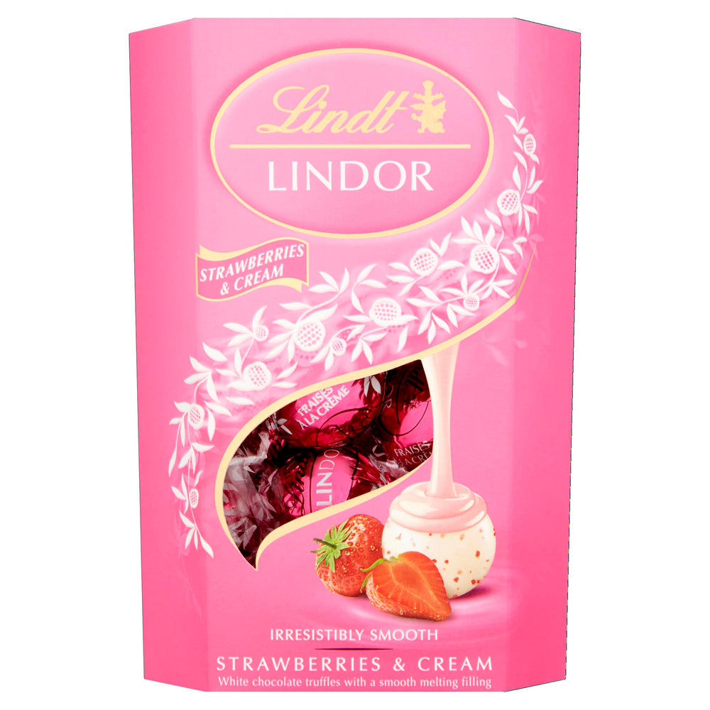 Lindt Lindor Strawberry & Cream truffle shell close-up, smooth melt perfect for gifting.