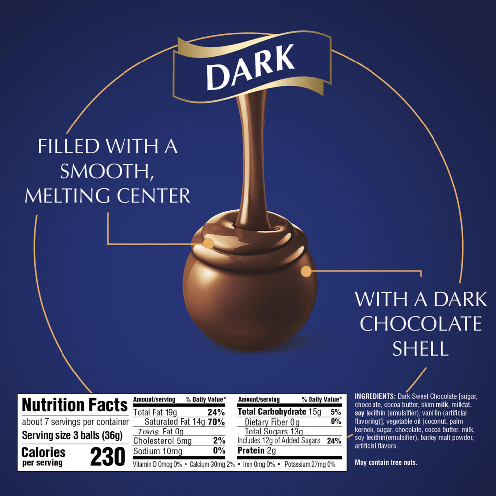 Close-up of the glossy dark chocolate shell on a Lindt LINDOR truffle.