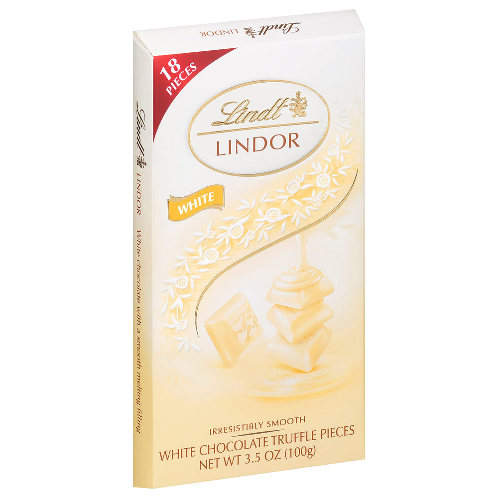 Lindt Lindor white bar packaging detail with elegant foil.