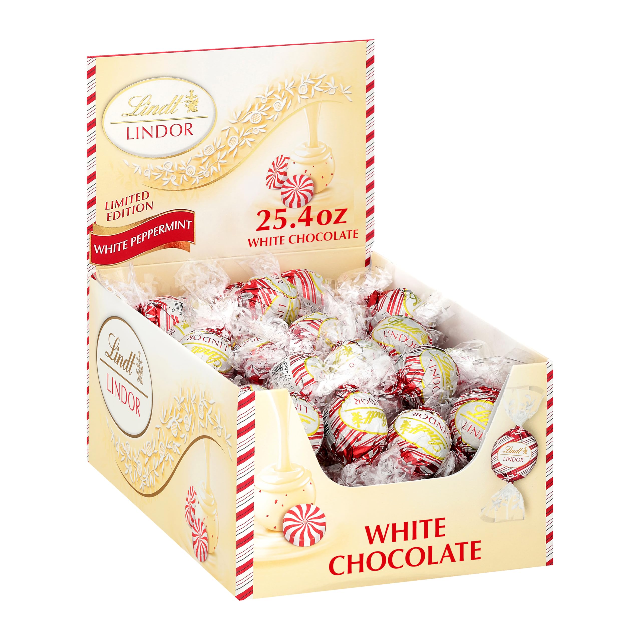 Lindt LINDOR white chocolate peppermint truffles box packaging showcases festive gift appeal.