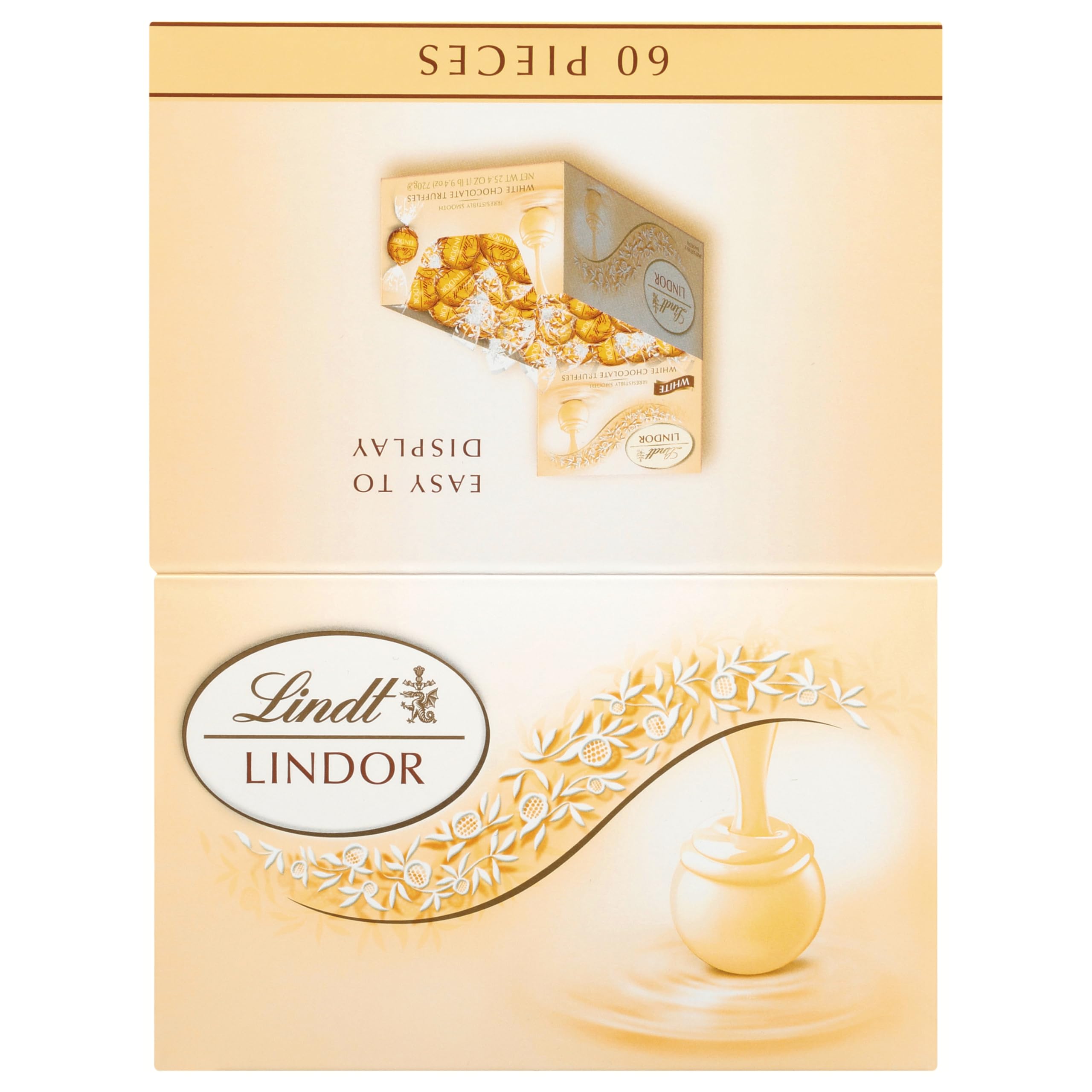 Lindt LINDOR White Truffles boxed on a tray for celebrations.