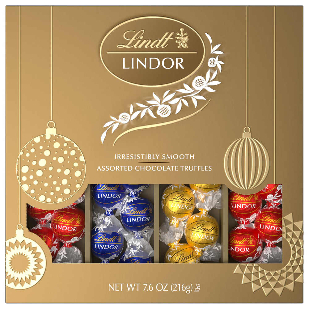 Lindt master chocolatiers crafting premium truffles with care