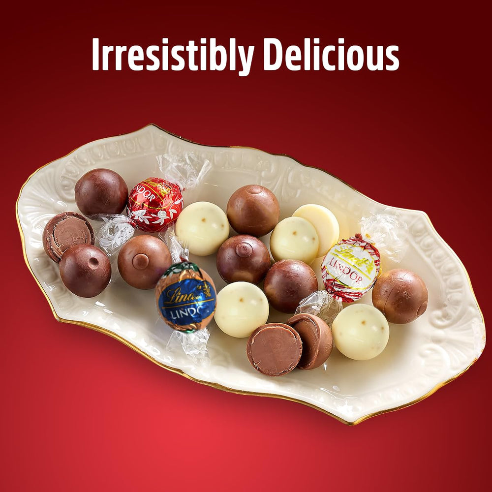 Lindt white peppermint truffles emphasize refreshing flavor and aromatic sweetness.