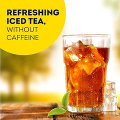 Lipton Decaf Cold Brew tea bags in a glass ready to drink.