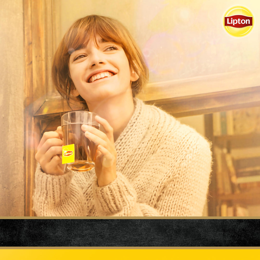 Lipton Decaffeinated Tea Bags brewing cup showcases hot tea aroma